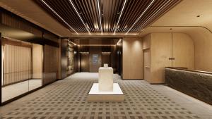 a lobby with a table in the middle of a building at UH Continental SeoulCenter in Seoul