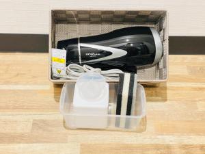 a box with a appliance sitting on a wooden floor at STEP by STEP - Vacation STAY 25753v in Kanayama