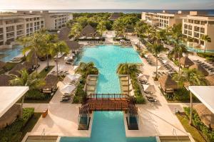 an aerial view of a pool at a resort at Paradisus by Meliá La Perla - Adults Only - Riviera Maya - All Inclusive in Playa del Carmen