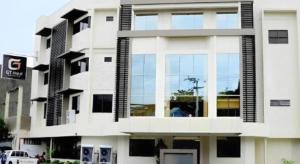 a building with a lot of windows on it at GT Hotel Bacolod in Bacolod