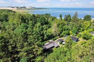 an aerial view of a house in the trees at FJ1404-Jaegerspris-Strandstien-17 in Jægerspris