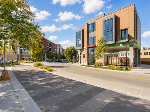 an empty street in a city with buildings at Upscale 3BR Penthouse by CozySuites in Indianapolis