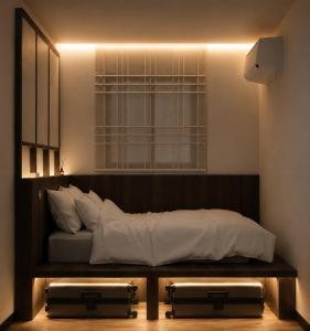 a bedroom with a bed with twounks in it at Stay Damyeon in Seoul