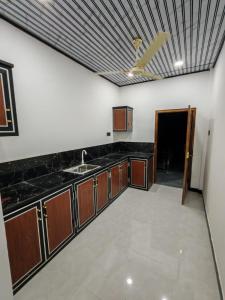 a kitchen with a sink and a counter top at VIN Solara Farm Stay in Jaffna +15 photos