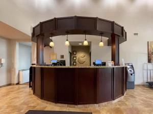an office with a large counter in a room at Comfort Suites Altoona North in Altoona +21 photos