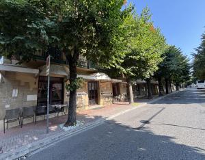 a building on the side of a street at Hotel Giglio in Montecatini Terme