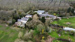 an aerial view of a large house in a field at Barnabrow Country House in Killinagh