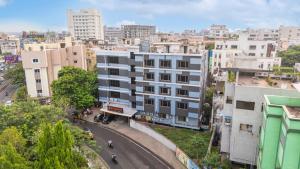 an overhead view of a city with buildings at The Orange Hotel in Visakhapatnam