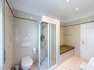 a bathroom with a shower and a toilet in it at Apartment Ca dei Noni by Interhome in Riva del Garda