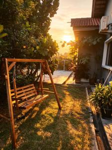 a swing in the yard of a house at MELAKA BEACH VILLA ( B TYPE ) in Malacca