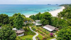 an aerial view of a resort with a beach at Le Panpurie Koh Lanta Resort - Near the Beach in Ko Lanta
