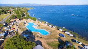 an aerial view of a park next to the water at Chata Zemplin in Kaluža