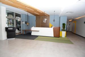 a lobby of an office with a reception desk at Holiday Inn Istanbul City by IHG in Istanbul +99 photos