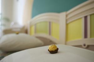 Uma cama ou camas num quarto em Wohnzimmer