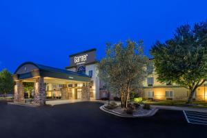 a rendering of a hotel at night at Garner Hotel Longview South by IHG in Longview