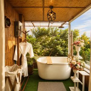 a bathroom with a bath tub and a window at Nj homestay in Ban Thung Phan Ha +28 photos