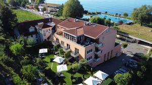 an aerial view of a house with a pool at Romantik Hotel Residenz am See in Meersburg