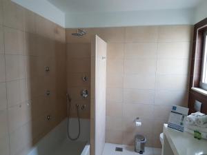 Koupelna v ubytování El Greco Hotel