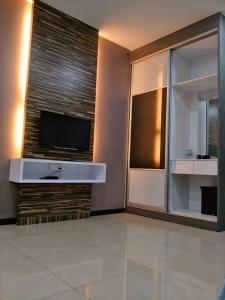 TV a/nebo společenská místnost v ubytování Lim Mini Hotel