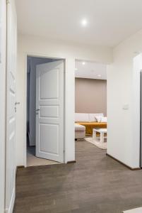 Postel nebo postele na pokoji v ubytování Marja Apartment