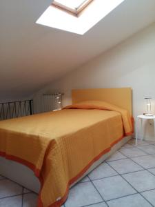A bed or beds in a room at Residence Di Via Perugina 22