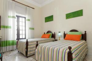 Postel nebo postele na pokoji v ubytování 18St. Hostel