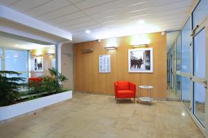 The lobby or reception area at Apparteo Nancy