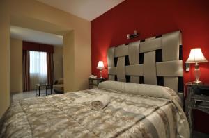 Postel nebo postele na pokoji v ubytování Hostal la Fuente