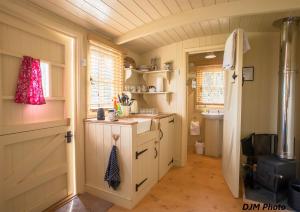 a kitchen with a sink and a counter in a room at Fourwinds B&B in March
