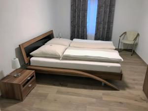 Postel nebo postele na pokoji v ubytování Ferienwohnungen Tannenhof