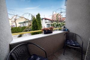 En balkon eller terrasse på Corner Apartment