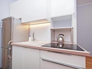 Kuchyňa alebo kuchynka v ubytovaní Gdynia Comfort Apartments 1