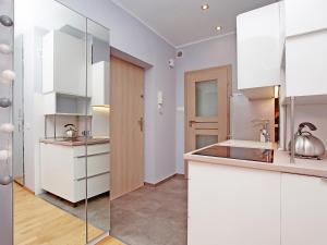Kuchyňa alebo kuchynka v ubytovaní Gdynia Comfort Apartments 1