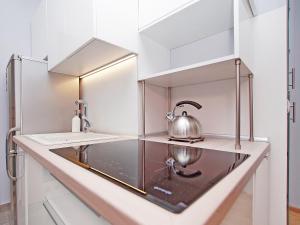 Kuchyňa alebo kuchynka v ubytovaní Gdynia Comfort Apartments 1