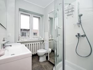 Kúpeľňa v ubytovaní Gdynia Comfort Apartments 1