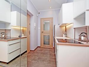 Kuchyňa alebo kuchynka v ubytovaní Gdynia Comfort Apartments 1