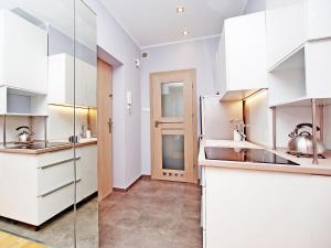 Kuchyňa alebo kuchynka v ubytovaní Gdynia Comfort Apartments 1