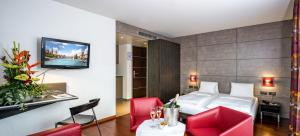 Postel nebo postele na pokoji v ubytování Hotel Sternen Oerlikon