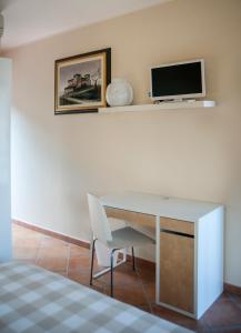 TV a/nebo společenská místnost v ubytování Incanto di Luna + 37 fotografií