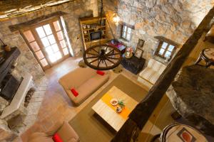 an overhead view of a living room with a stone building at Villa Zamelinjak in Vrbnik