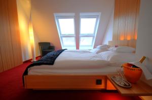 Ein Bett oder Betten in einem Zimmer der Unterkunft Hotel Antoniushütte