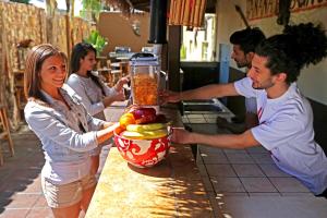 a man and a woman holding a jar of food at Banana Bungalow Hollywood Hotel & Hostel in Los Angeles