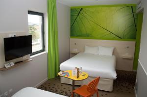 Katil atau katil-katil dalam bilik di ibis styles Villeneuve Sur Lot