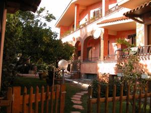 A balcony or terrace at B&B Alla Fiera