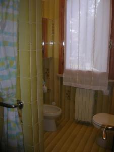 Ванная комната в Monolocale con 2 posti letto