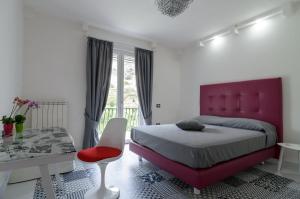 Postel nebo postele na pokoji v ubytování Rosa e Valentino