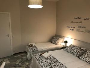 Postel nebo postele na pokoji v ubytování MyRoom In Town