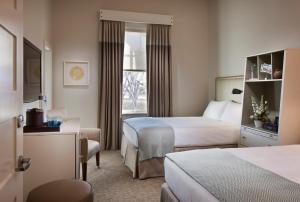Postelja oz. postelje v sobi nastanitve Hotel Parq Central Albuquerque