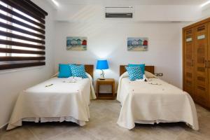 Postel nebo postele na pokoji v ubytování Aligio Apart-hotel & Spa - Las Terrenas + 37 fotografií