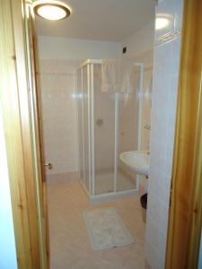 Koupelna v ubytování Hotel Pensione Dolomiti